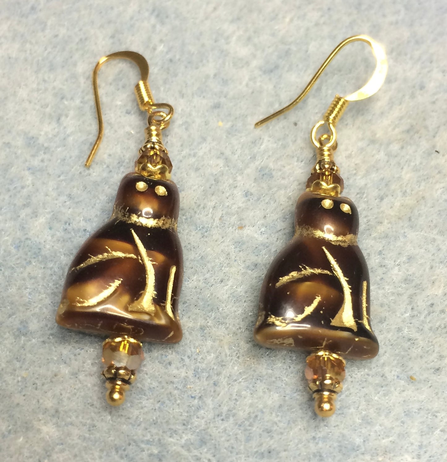 Brown gold (with gold inlay) Czech glass cat bead earrings adorned with amber Czech glass beads.