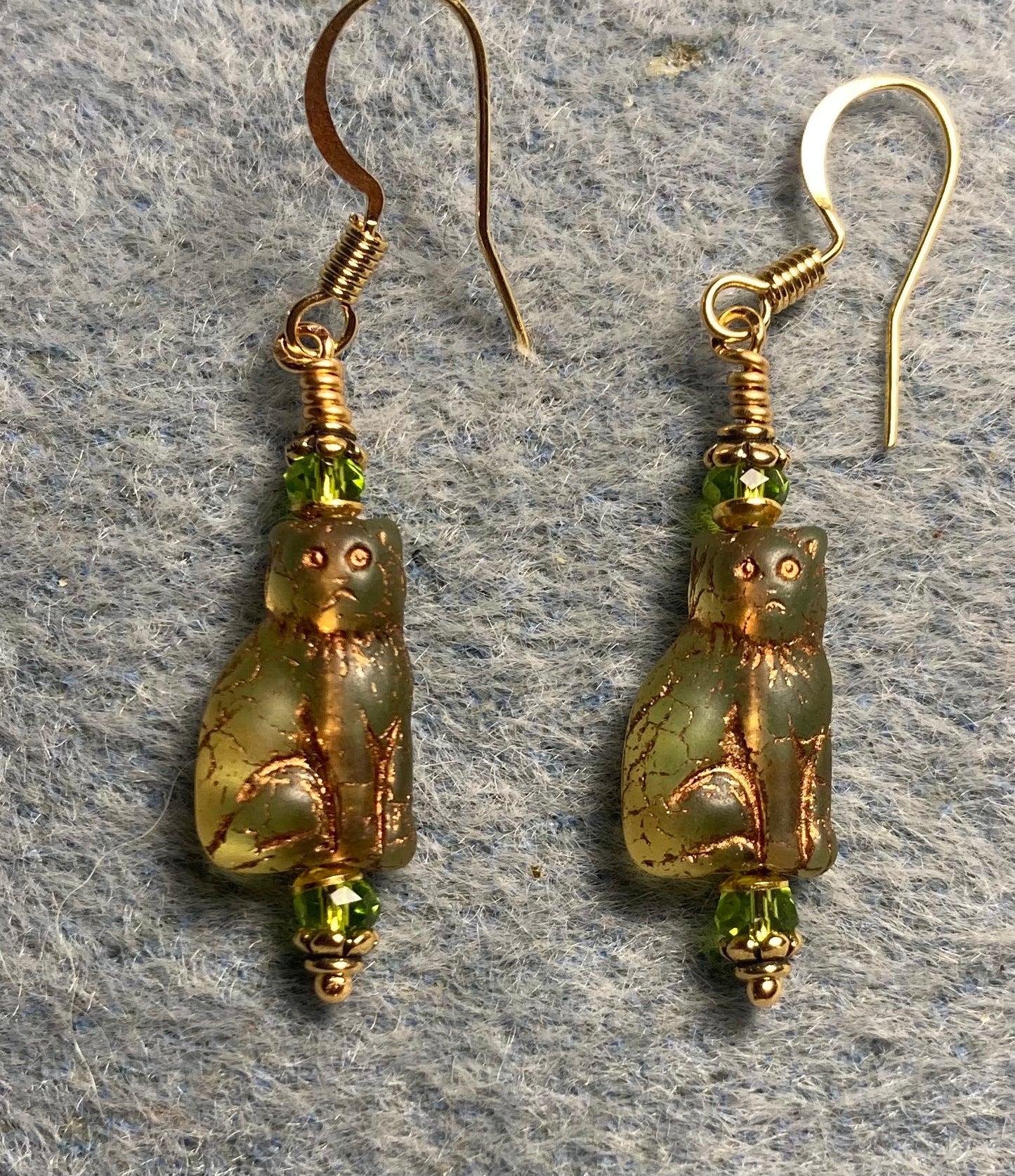 Small olive green and gold Czech glass cat bead earrings adorned with olive green gold Chinese crystal beads.