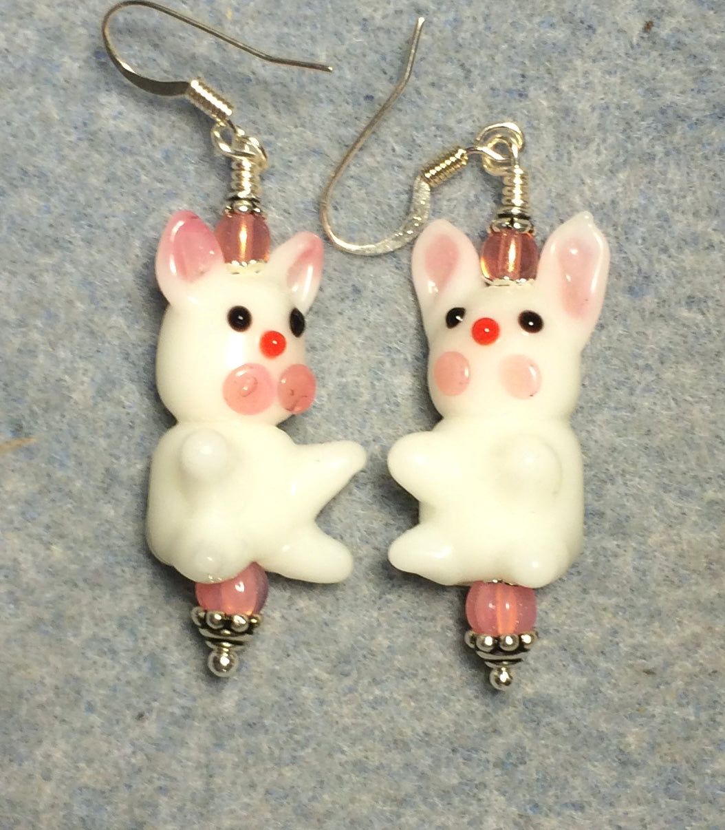 White and pink lamp work bunny rabbit bead earrings adorned with pink Czech glass beads.