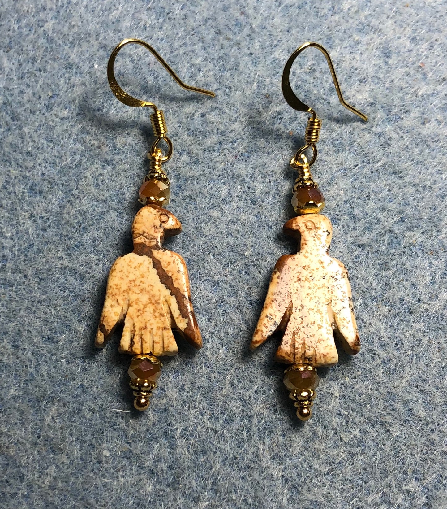 Tan picture jasper gemstone eagle bead earrings adorned with tan Chinese crystal beads.