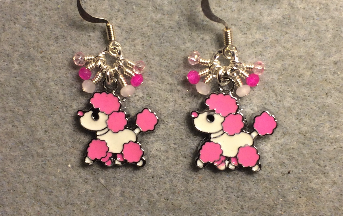 Hot pink and white enamel poodle charm earrings adorned with tiny dangling hot pink, light pink, and white Chinese crystal beads.