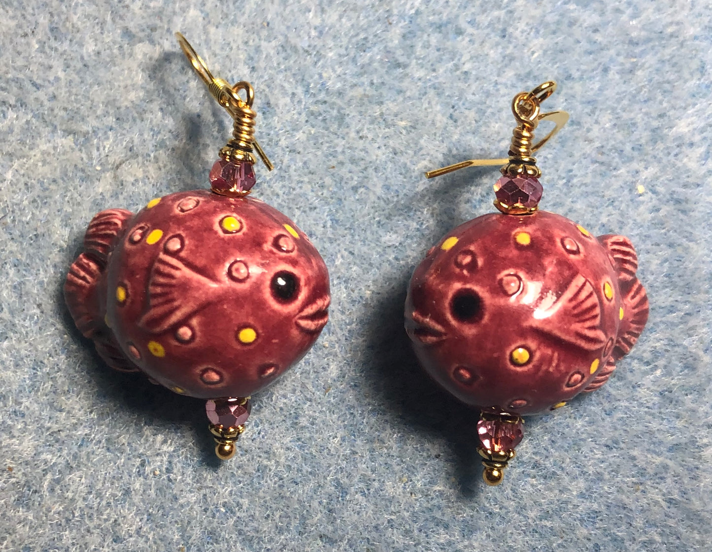 Rose pink ceramic blowfish bead earrings adorned with rose pink Chinese crystal beads.