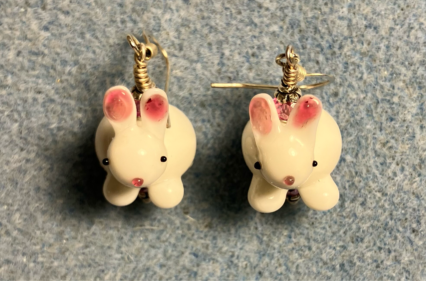 White and pink lamp work bunny rabbit bead earrings adorned with pink Chinese crystal beads.
