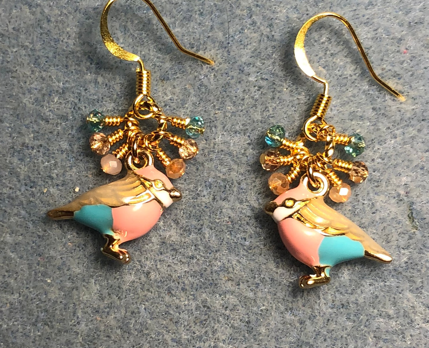 Peach, aqua, and tan enamel finch charm earrings adorned with tiny dangling peach, aqua, and tan Chinese crystal beads.