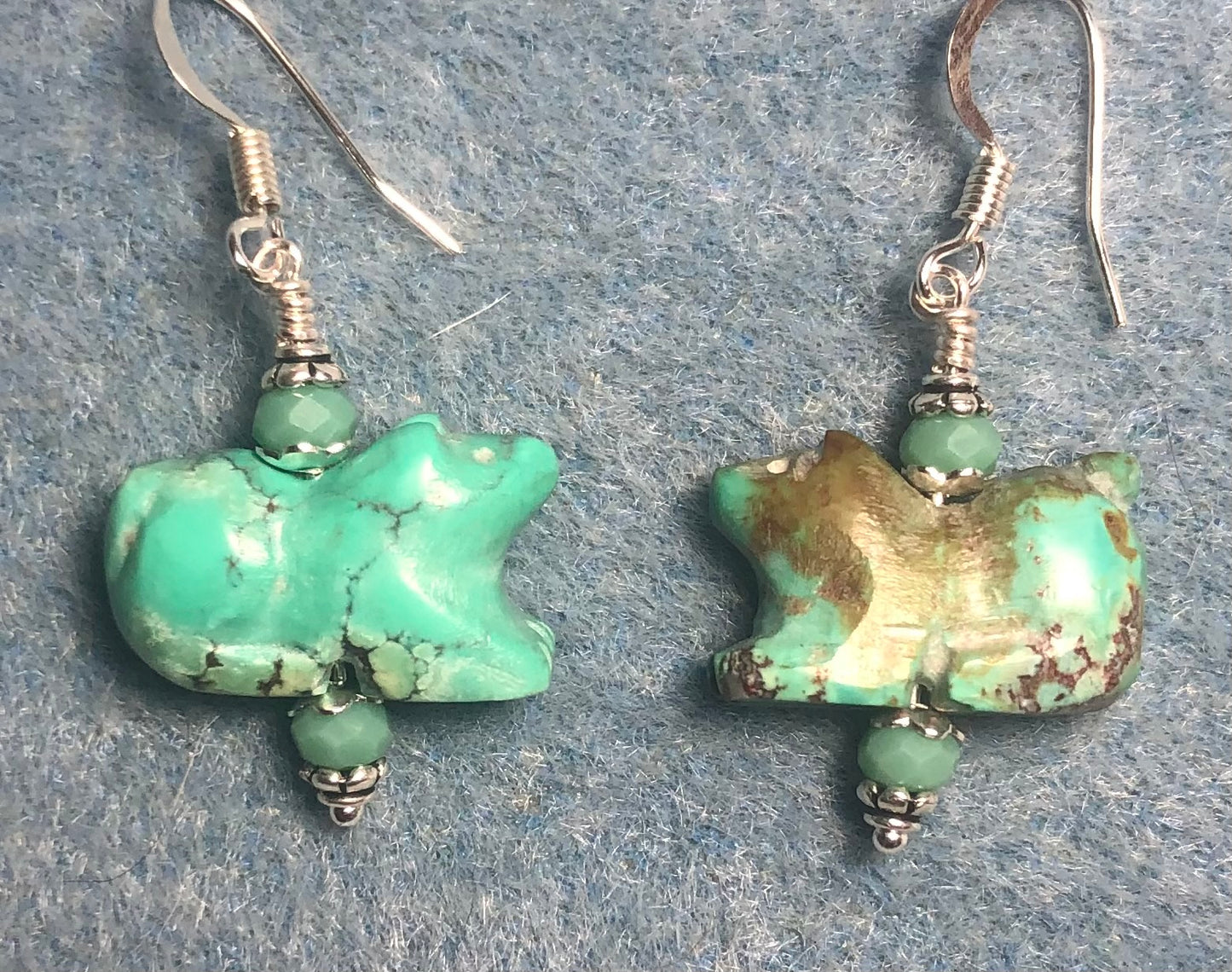 Turquoise gemstone dog bead earrings adorned with turquoise Chinese crystal beads.