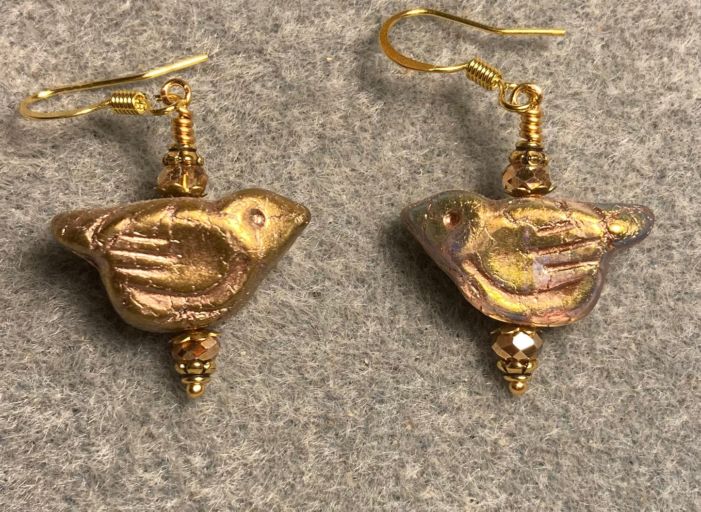 Gold Czech glass bird bead earrings adorned with gold Chinese crystal beads.