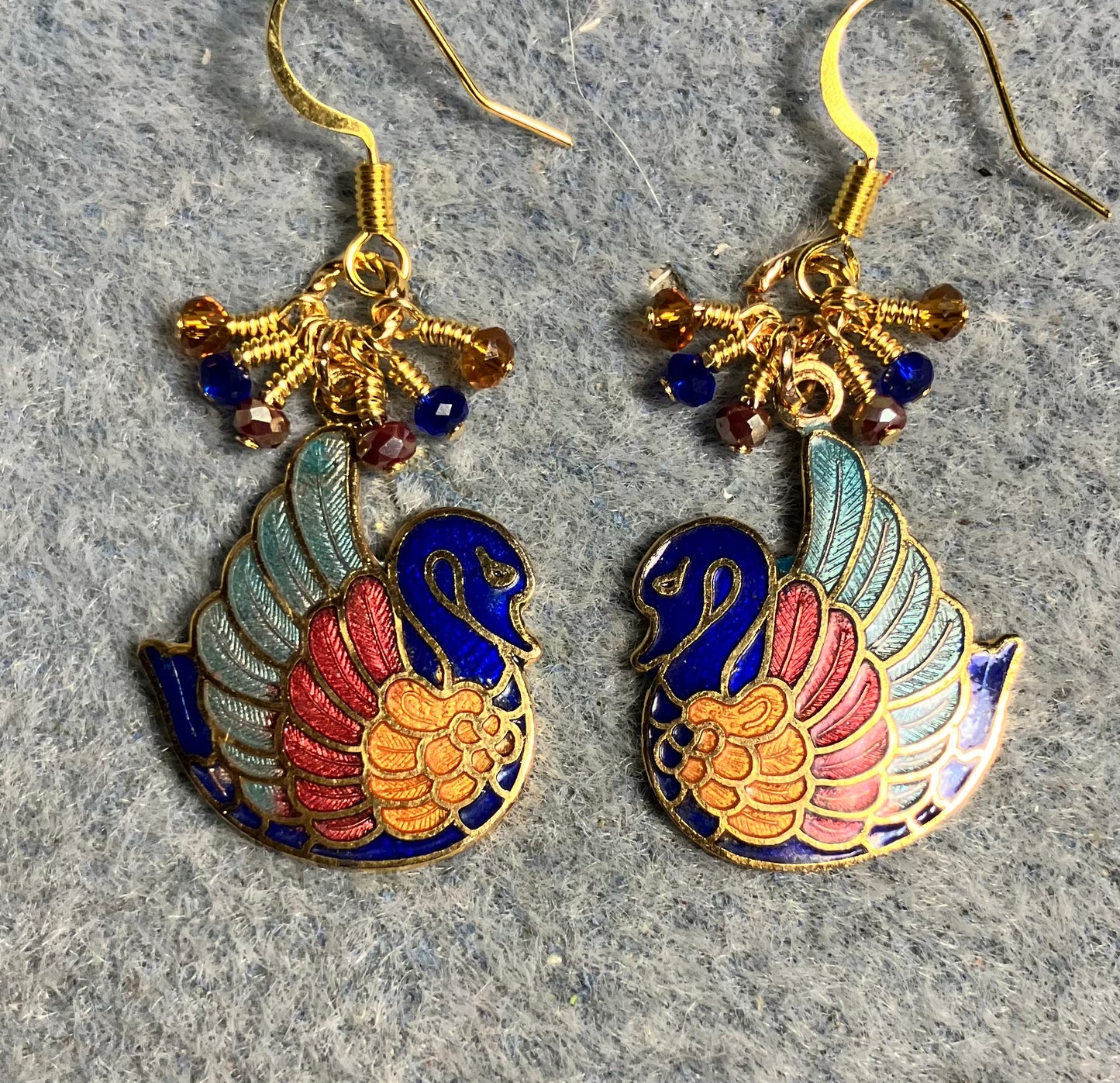 Vintage blue, red, and amber cloisonné swan charm earrings adorned with tiny dangling blue, red, and amber Chinese crystal beads.