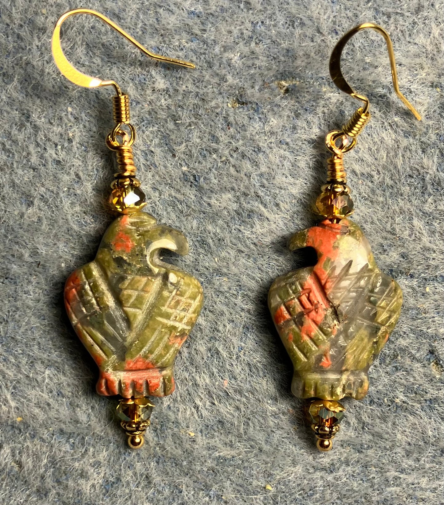 Green and peach unakite gemstone eagle bead earrings adorned with peach Chinese crystal beads.