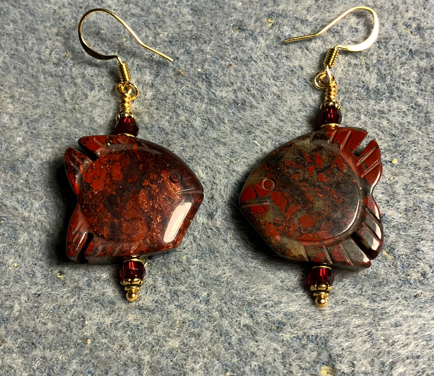 Large red brecciated jasper gemstone angelfish bead earrings adorned with dark red Chinese crystal beads.
