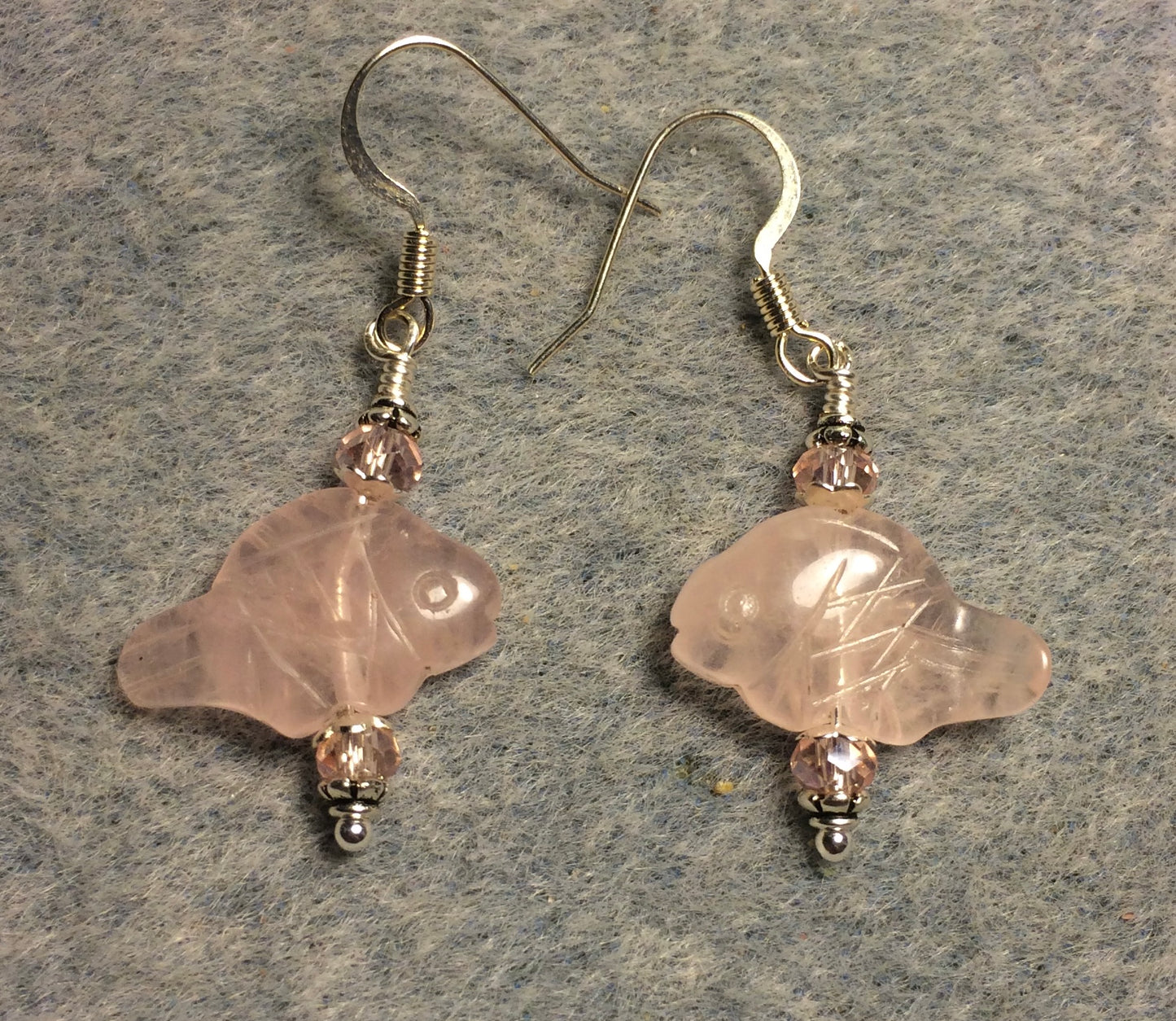 Small pink rose quartz gemstone fish bead earrings adorned with pink Chinese crystal beads.