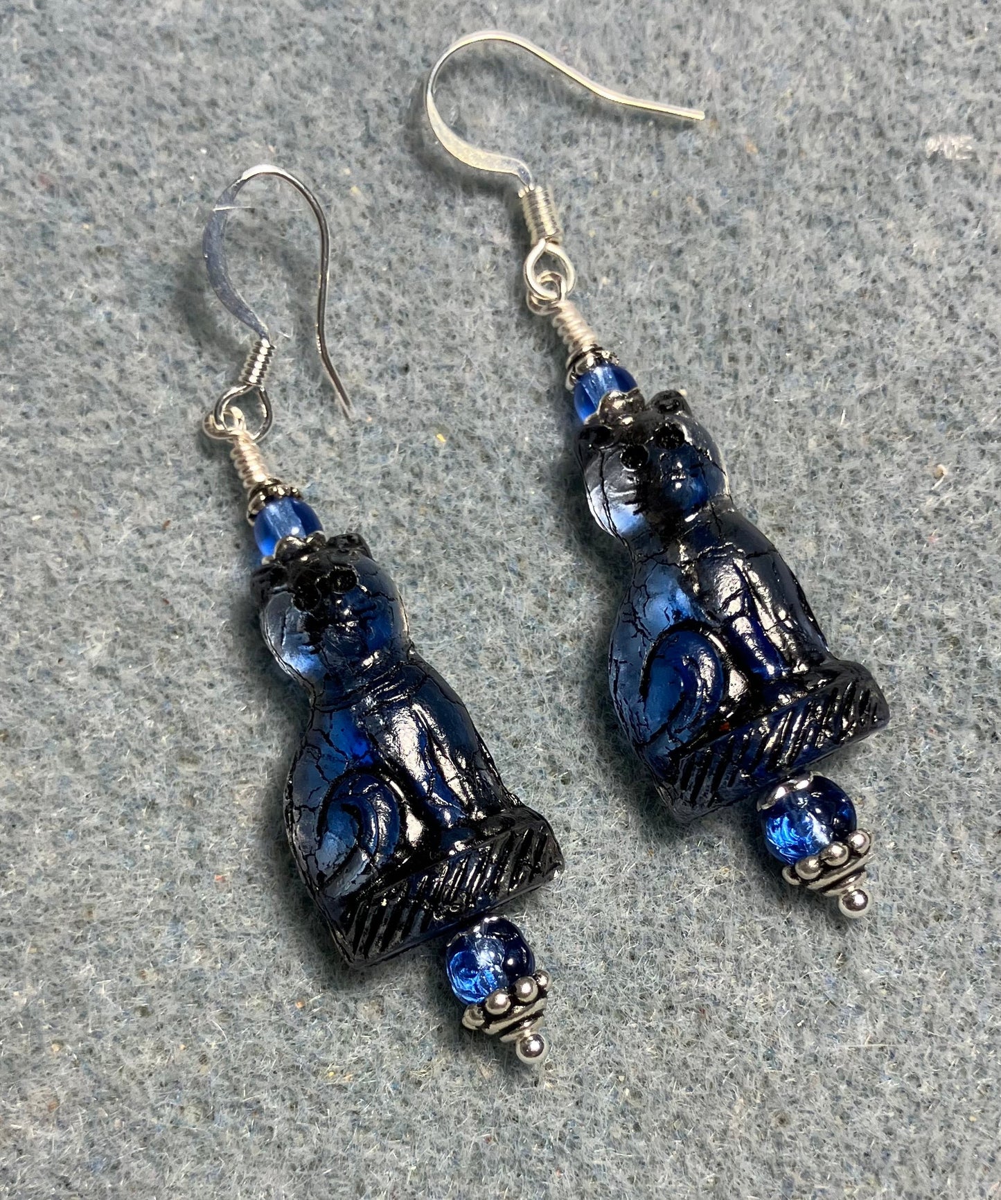 Dark blue (with black inlay) fancy Czech glass cat bead earrings adorned with dark blue Czech glass beads.