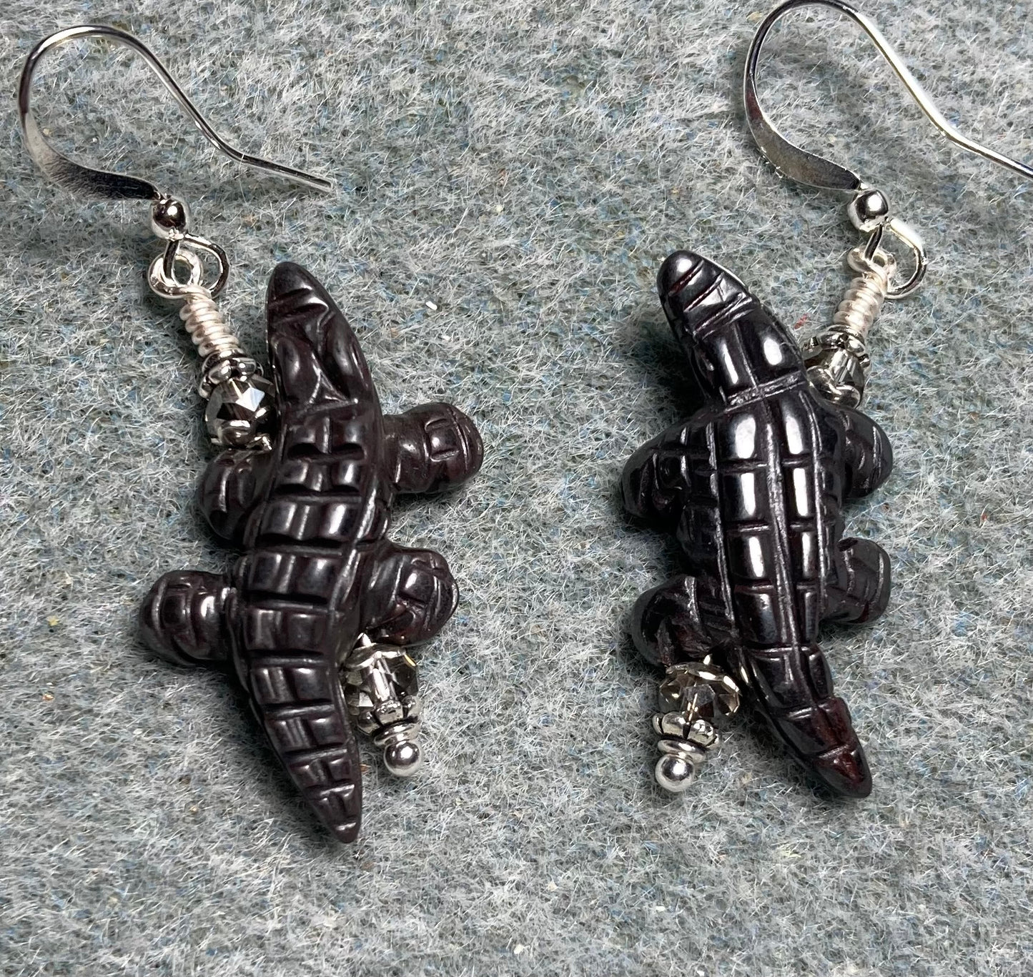 Gray hematite gemstone alligator bead earrings adorned with gray Chinese crystal beads.