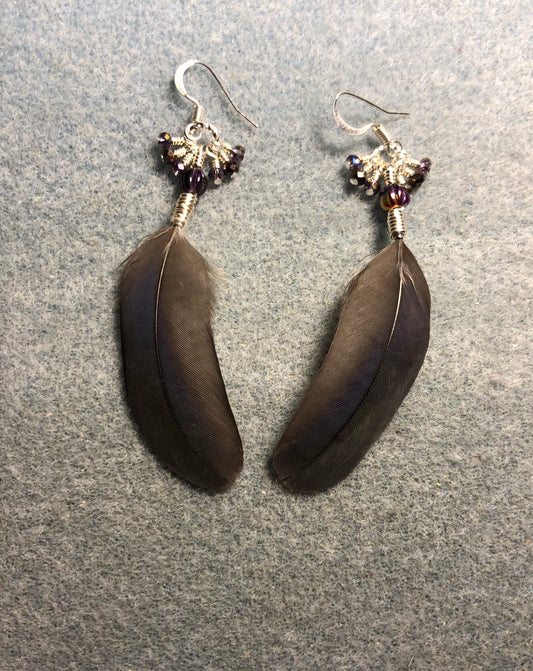 Purple and bronze Pionus parrot feather earrings adorned with purple Czech glass beads and tiny dangling purple and bronze Chinese crystal beads.