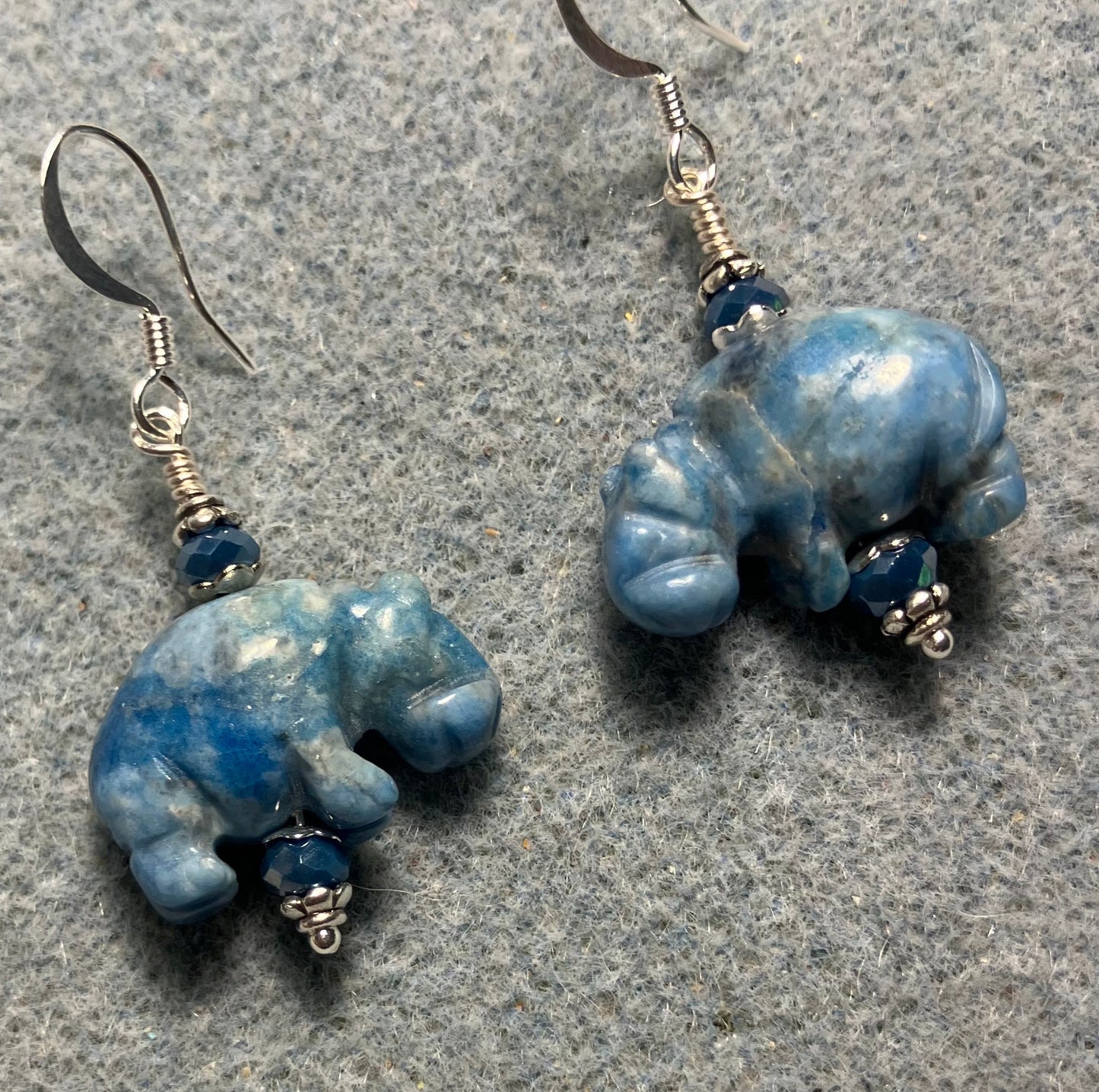 Blue lapis gemstone hippo bead earrings adorned with blue Chinese crystal beads.