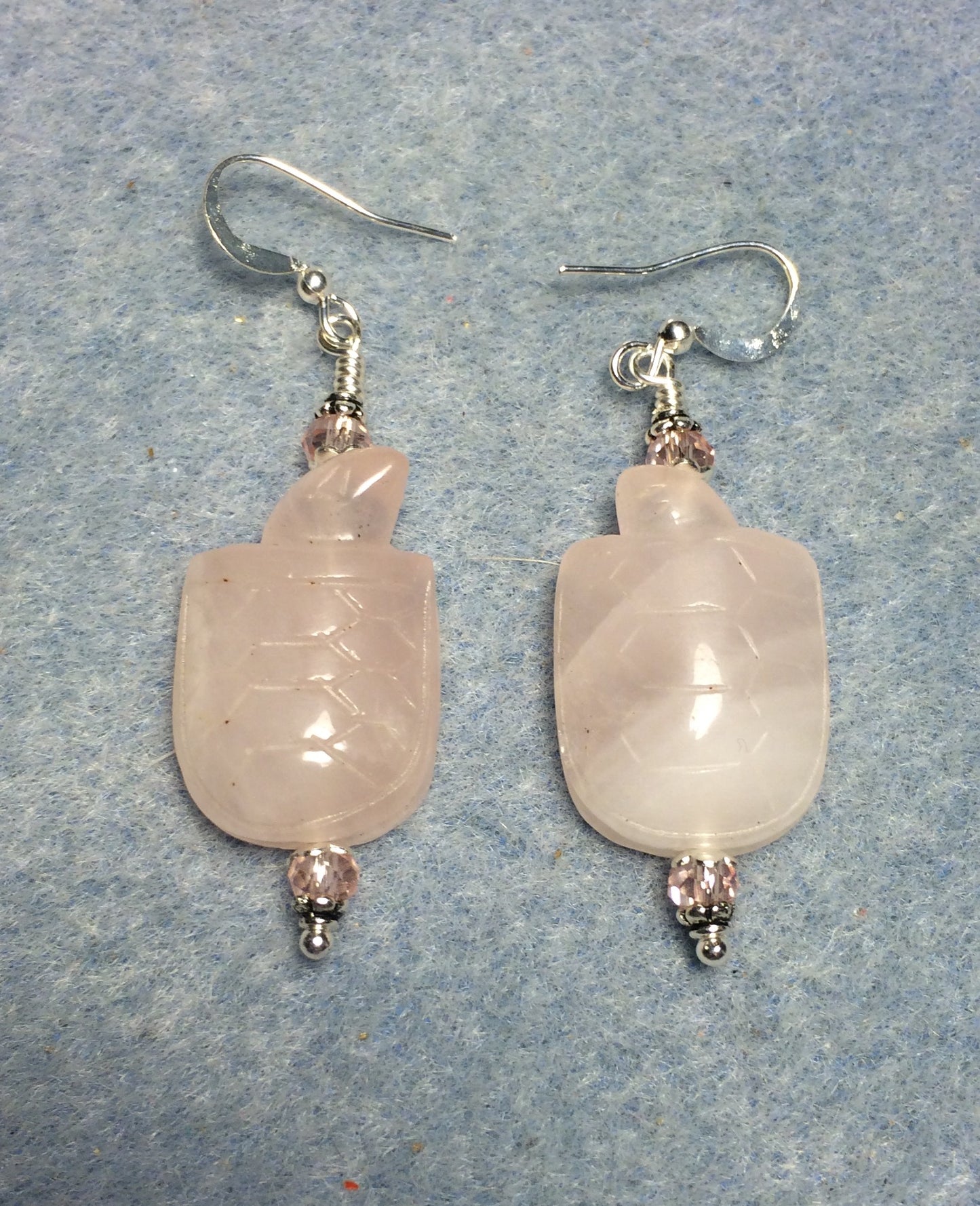 Pink rose quartz gemstone turtle bead earrings adorned with pink Chinese crystal beads.