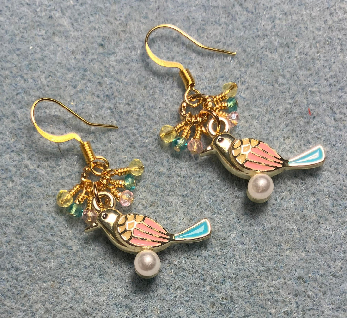Pink, yellow, and turquoise enamel finch charm earrings adorned with tiny pink, yellow, and turquoise Chinese crystal beads.