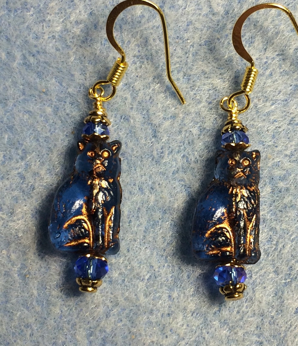 Small dark blue (with copper inlay) Czech glass cat bead earrings adorned with dark blue Chinese crystal beads.