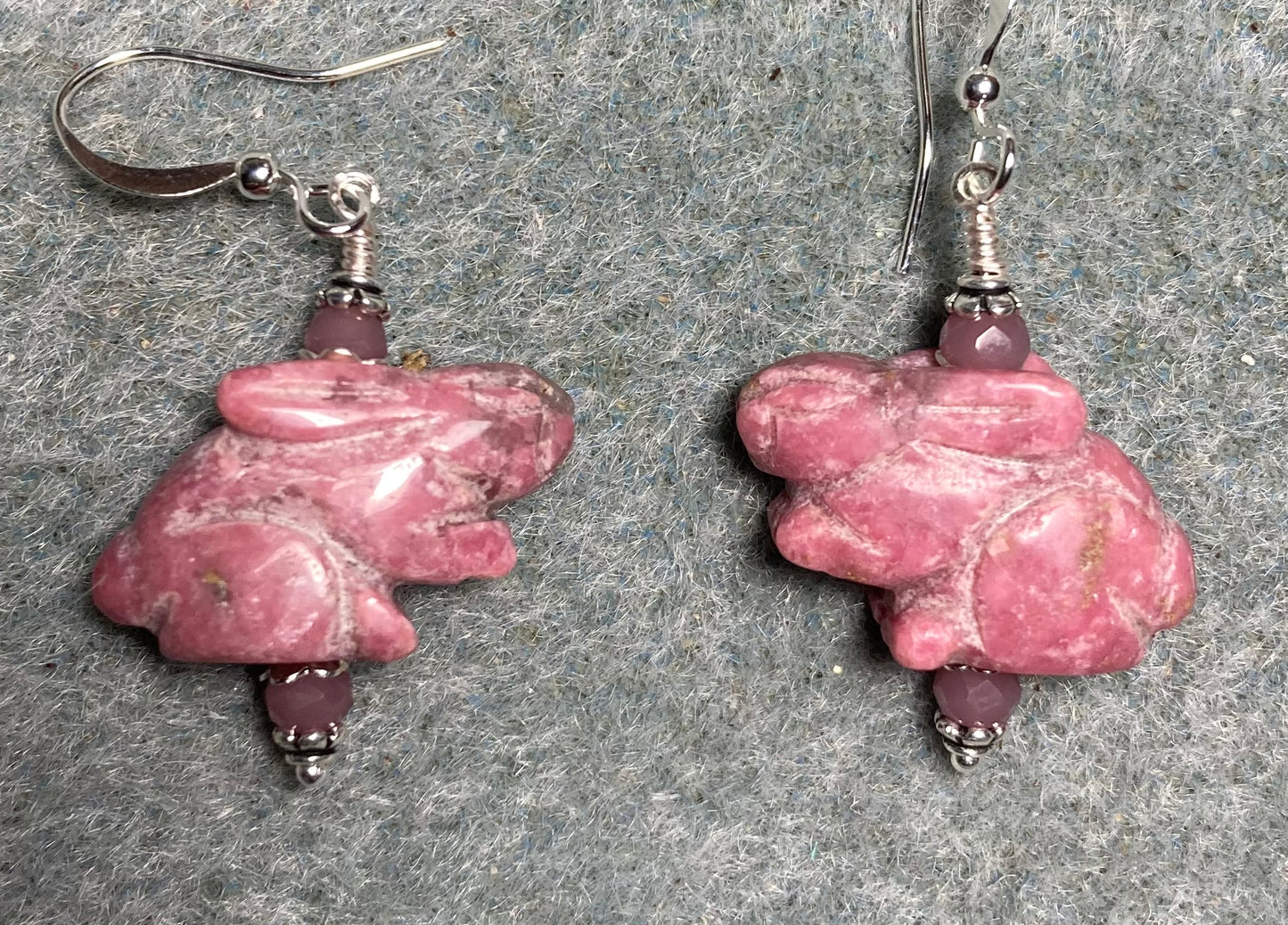 Pink rhodonite gemstone rabbit bead earrings adorned with pink Chinese crystal beads.