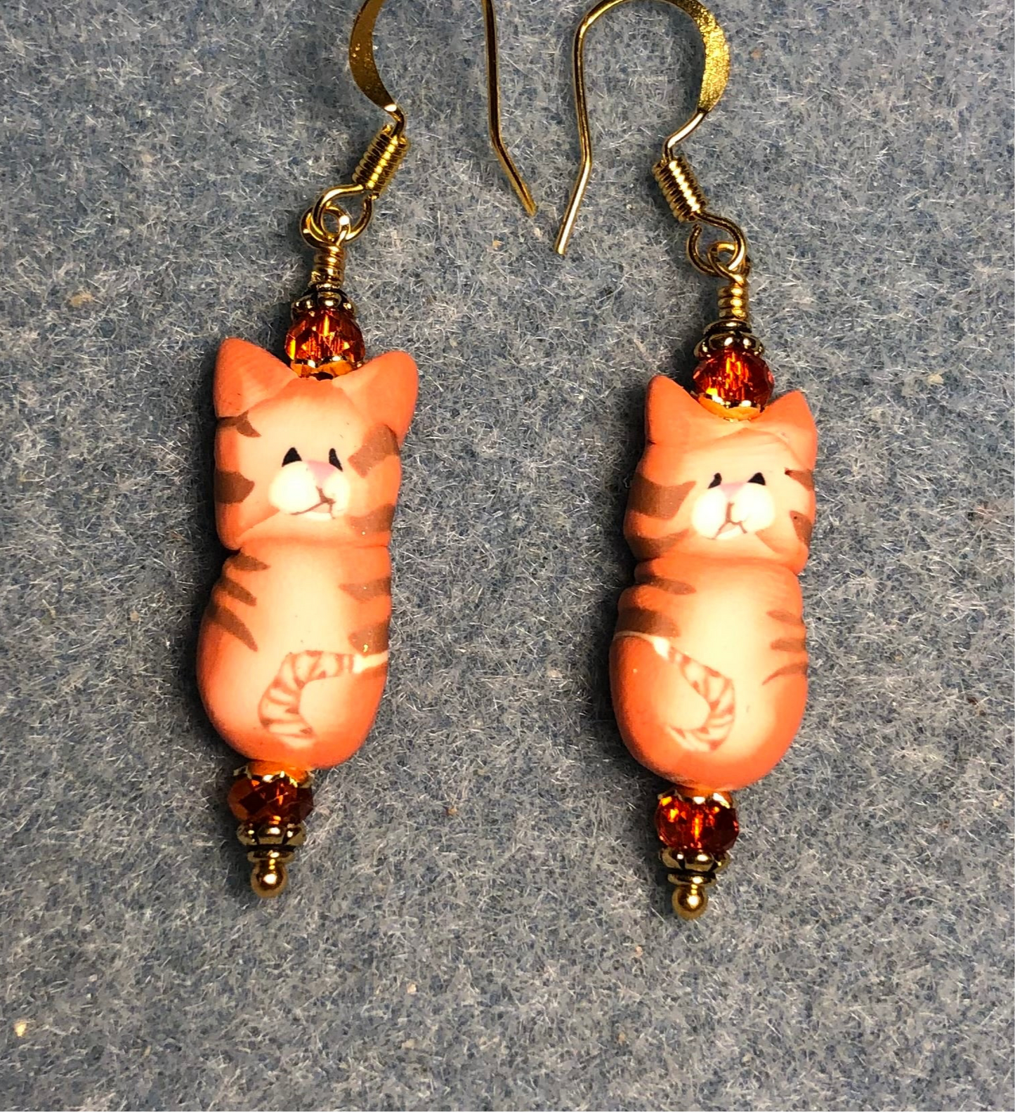 Orange polymer clay striped tabby cat bead earrings adorned with orange Chinese crystal beads.