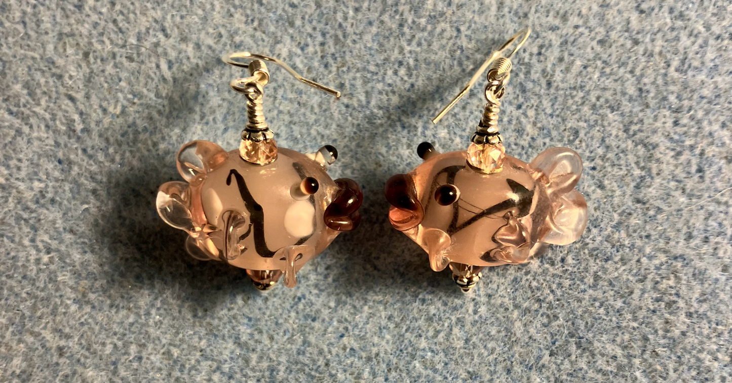 Pink and black lamp work kissing fish bead earrings adorned with pink Chinese crystal beads.