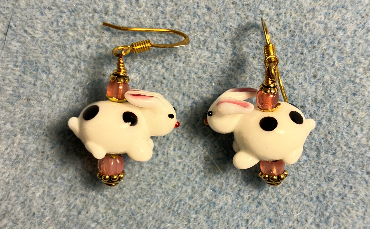 White and pink lamp work bunny rabbit bead earrings adorned with pink Czech glass beads.