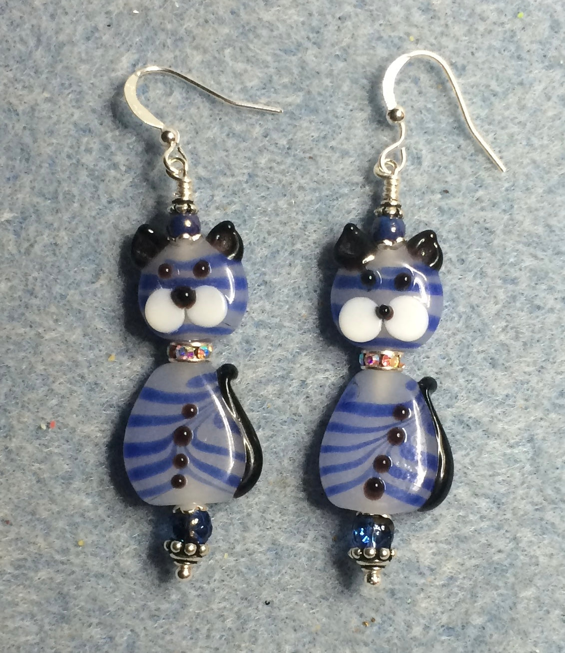 Blue and white striped lamp work two piece cat bead earrings adorned with clear rhinestone “collars” and blue Czech glass beads.