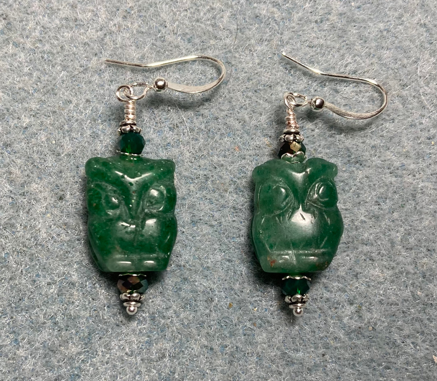 Dark green aventurine gemstone owl bead earrings adorned with dark green Chinese crystal beads.