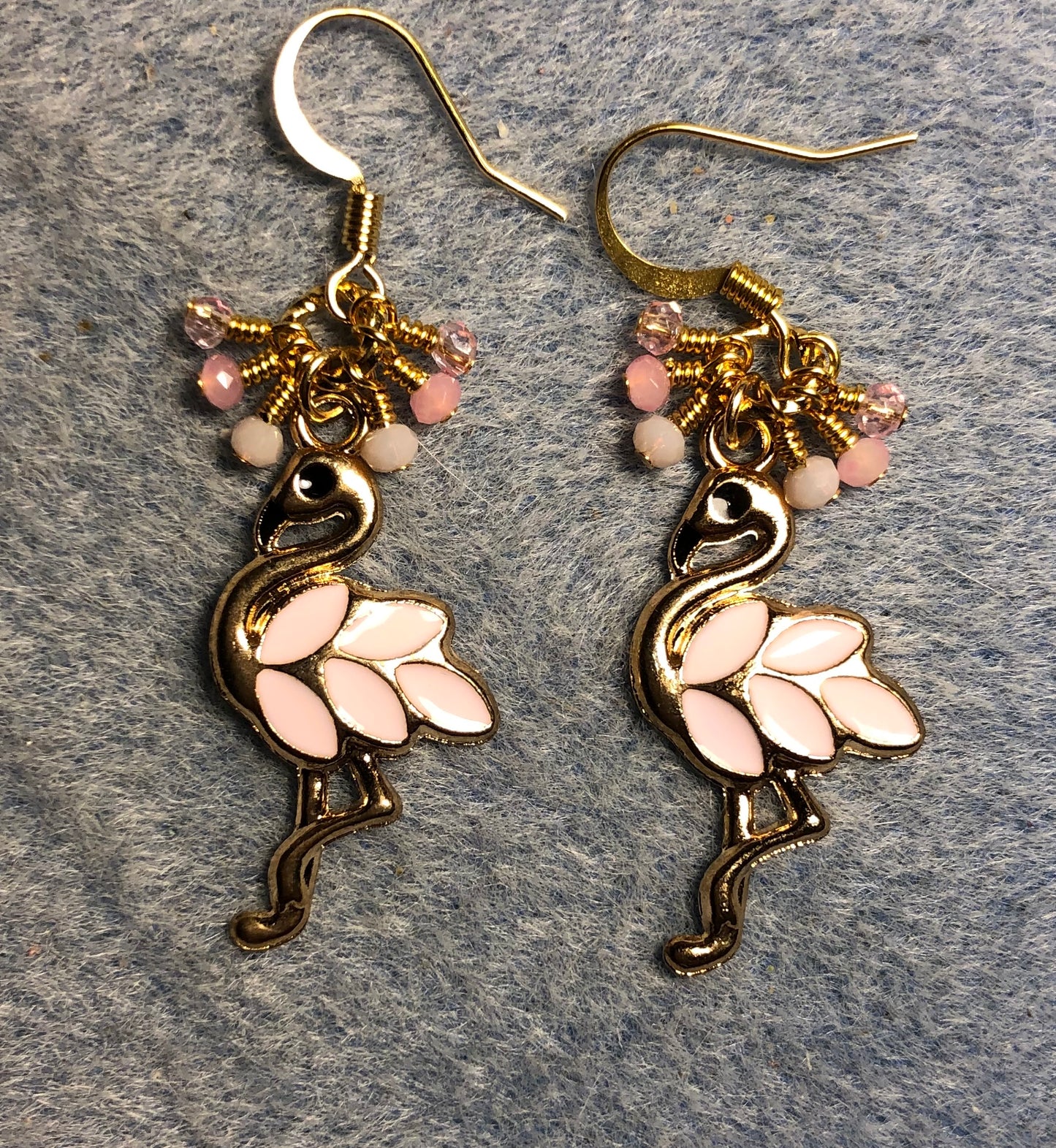 Light pink and gold enamel flamingo charm earrings adorned with tiny dangling pink Chinese crystal beads.