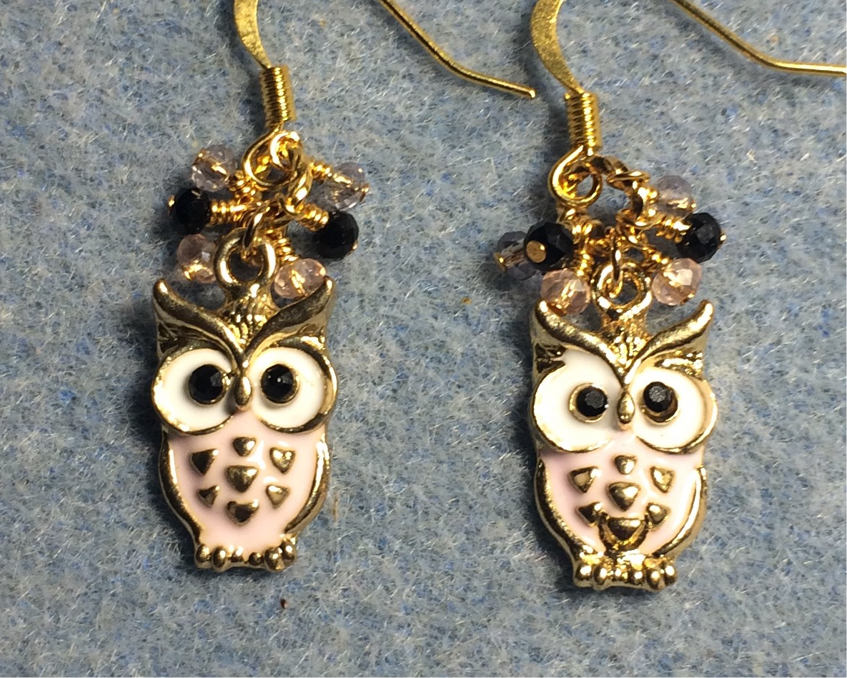 Pink and white enamel owl charm earrings adorned with tiny dangling pink, peach, and black Chinese crystal beads.