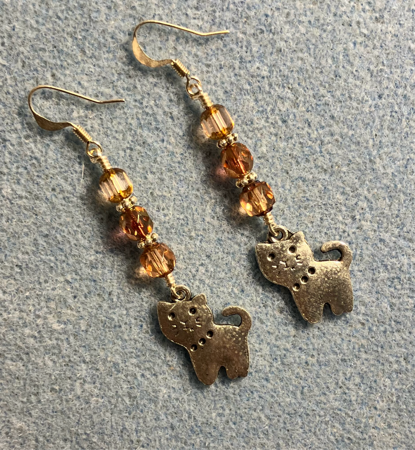 Silver cat charm earrings adorned with rose Czech glass beads