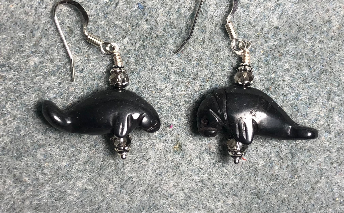 Gray hematite gemstone manatee bead earrings adorned with gray Chinese crystal beads.