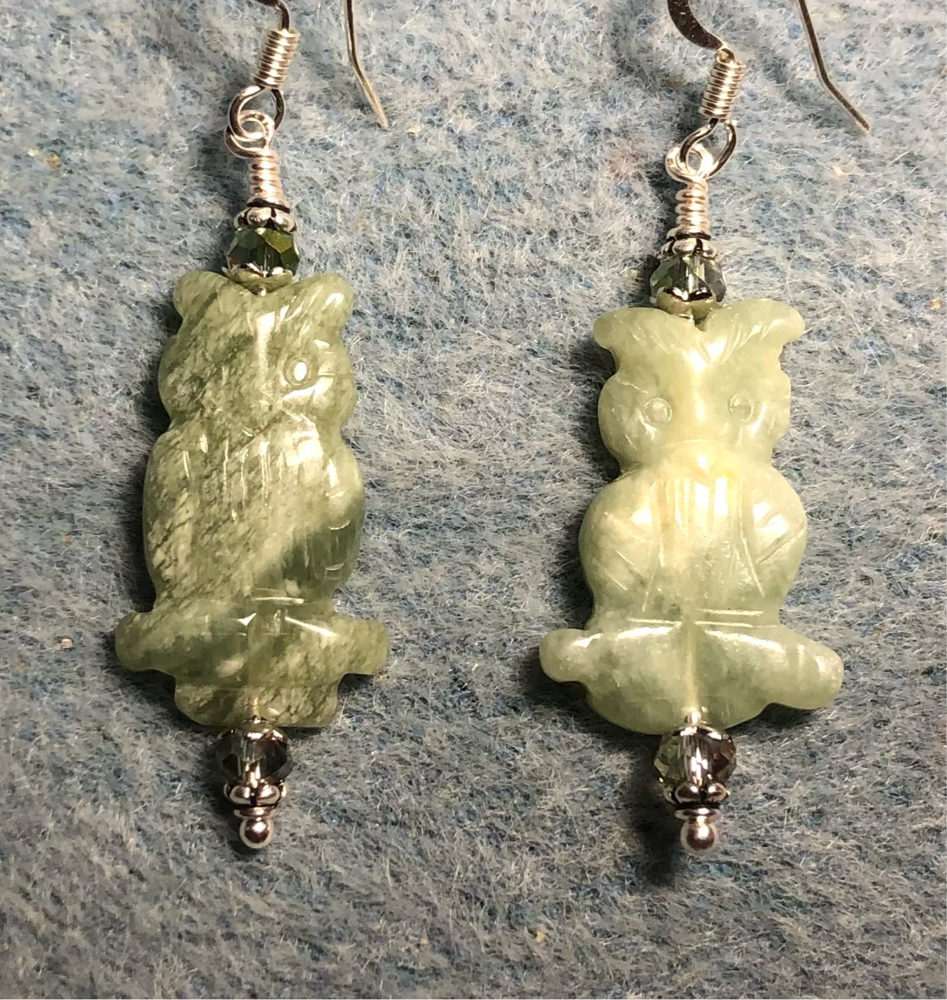 Light green aventurine gemstone owl bead earrings adorned with light green Chinese crystal beads.