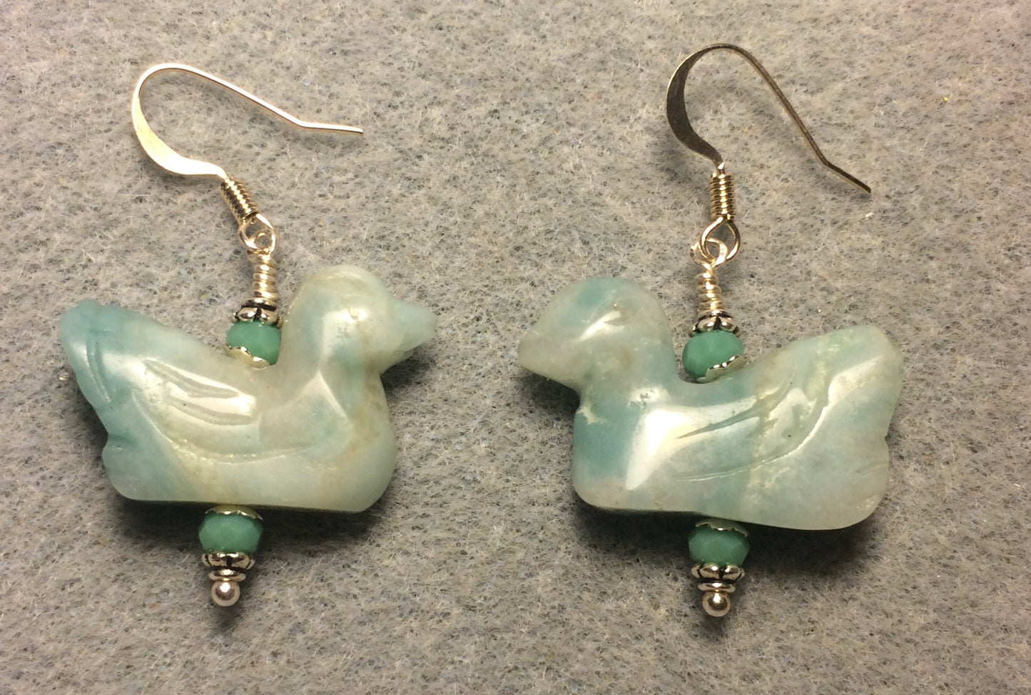 Blue green amazonite gemstone duck bead earrings adorned with turquoise Chinese crystal beads.