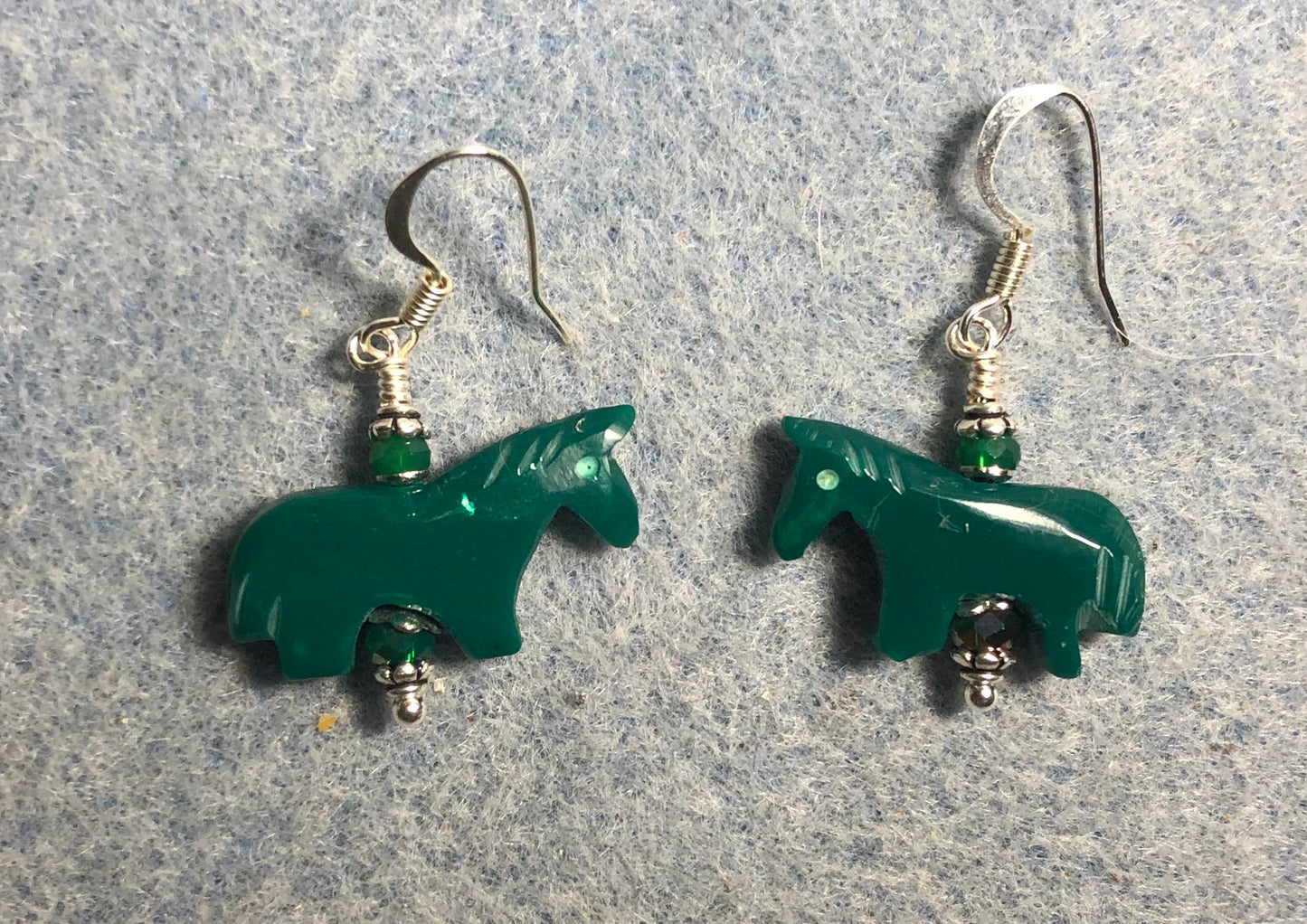 Dark green stone horse bead earrings adorned with dark green Chinese crystal beads.