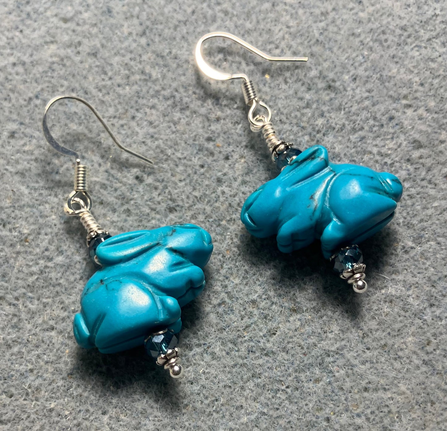 Turquoise howlite gemstone rabbit bead earrings adorned with turquoise Chinese crystal beads.
