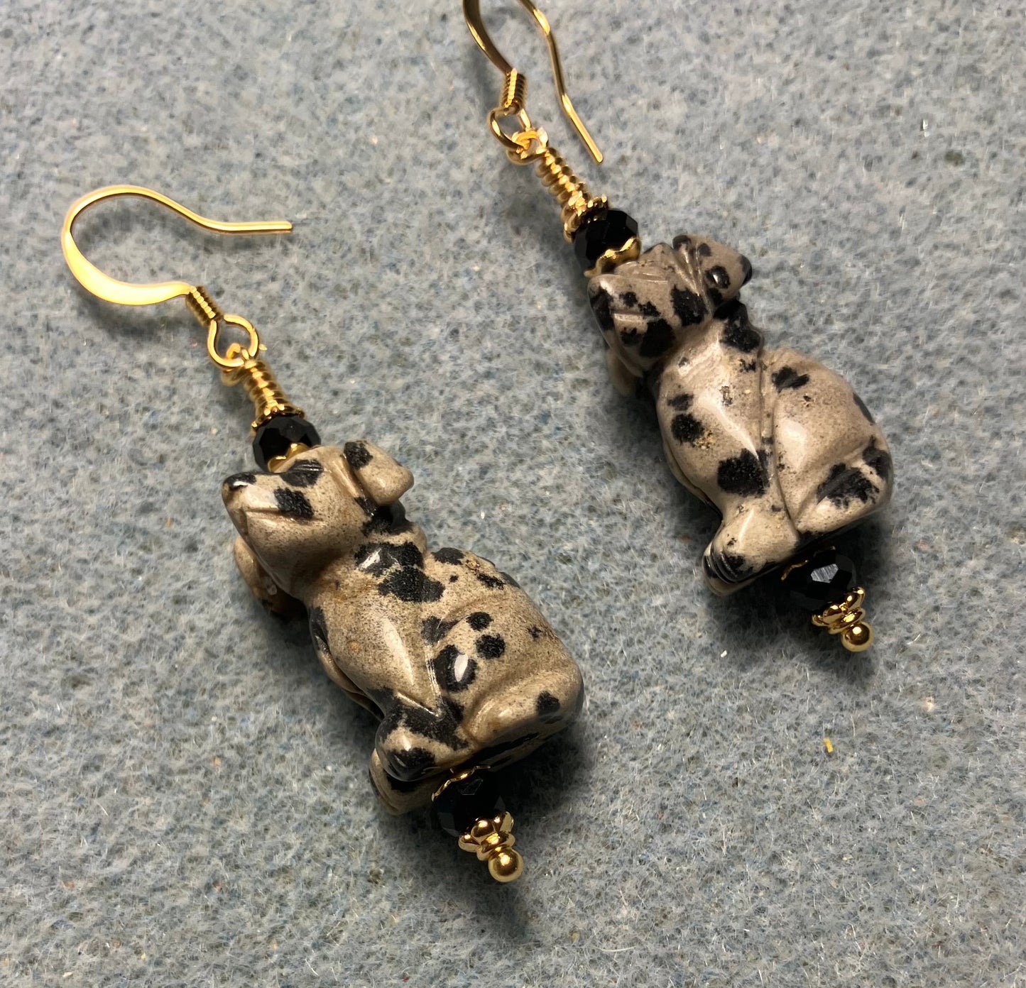 Dalmatian jasper gemstone dog bead earrings adorned with black Chinese crystal beads.