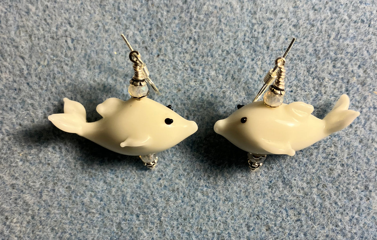 White lamp work whale bead earrings adorned with white Chinese crystal beads.