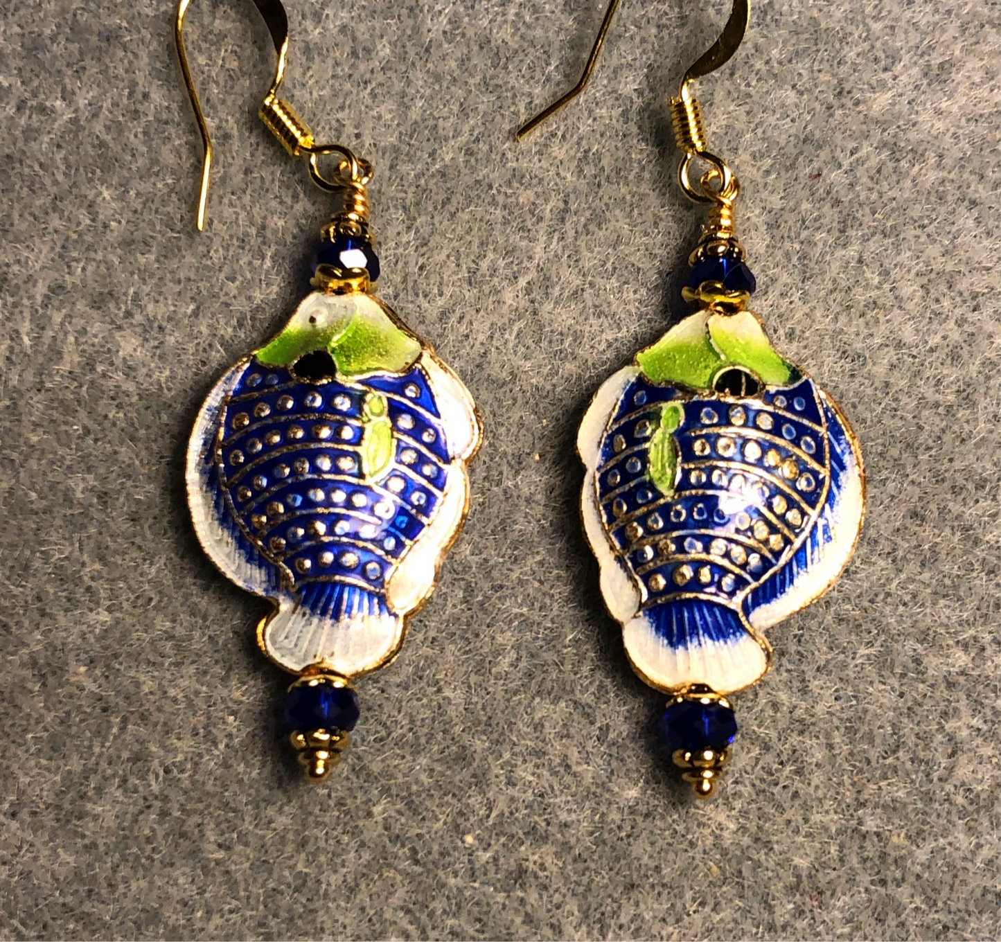 Dark blue and green cloisonné fish bead earrings adorned with dark blue Chinese crystal beads.