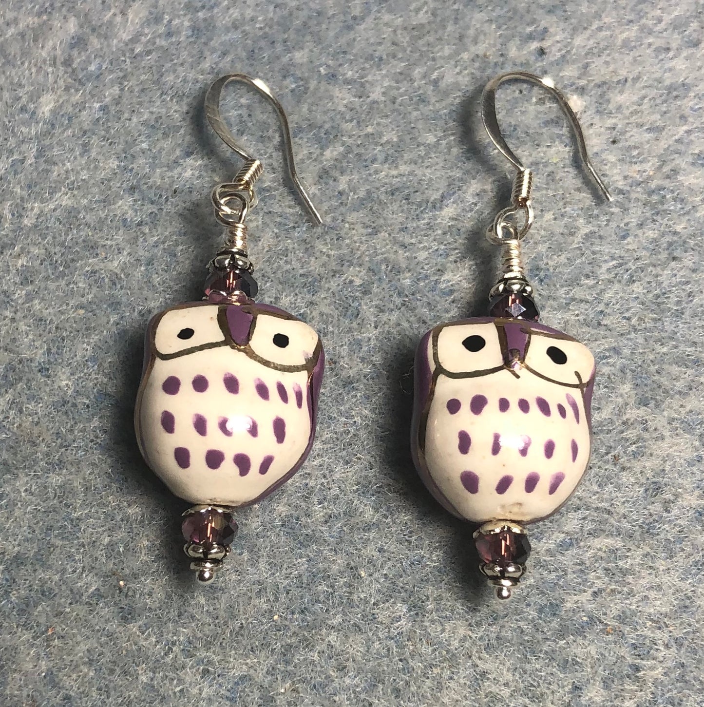 Purple ceramic spotted owl bead earrings adorned with purple Chinese crystal beads.