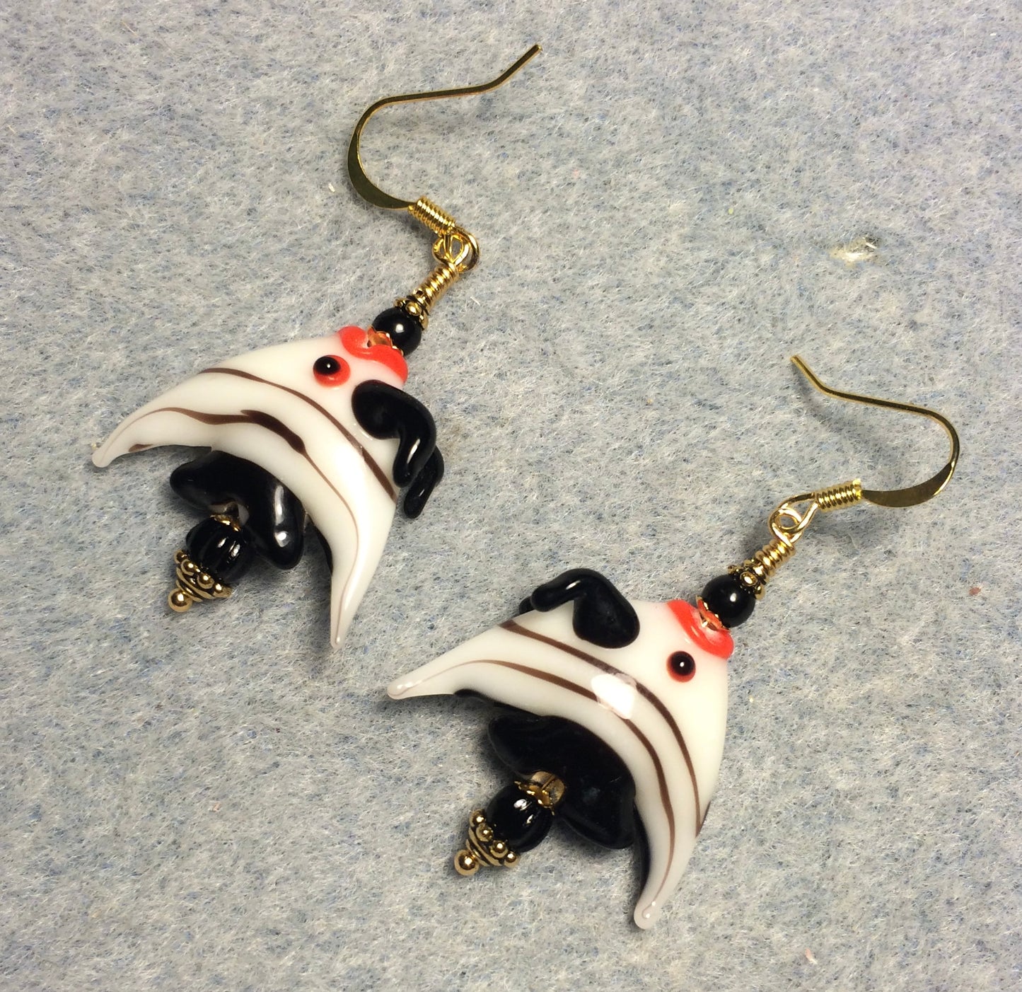 Black and white striped lamp work angelfish bead earrings adorned with black Czech glass beads.