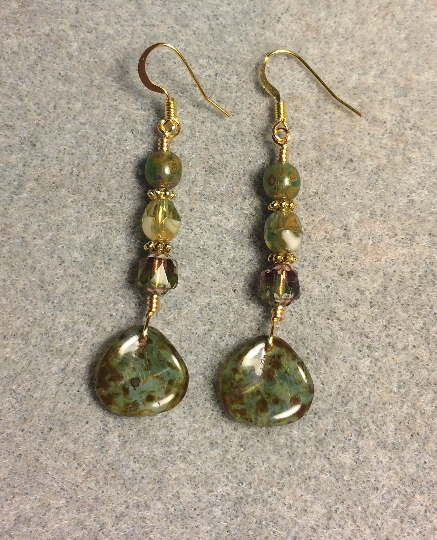 Green Picasso Czech glass rose petal earrings adorned with green Picasso Czech glass beads.
