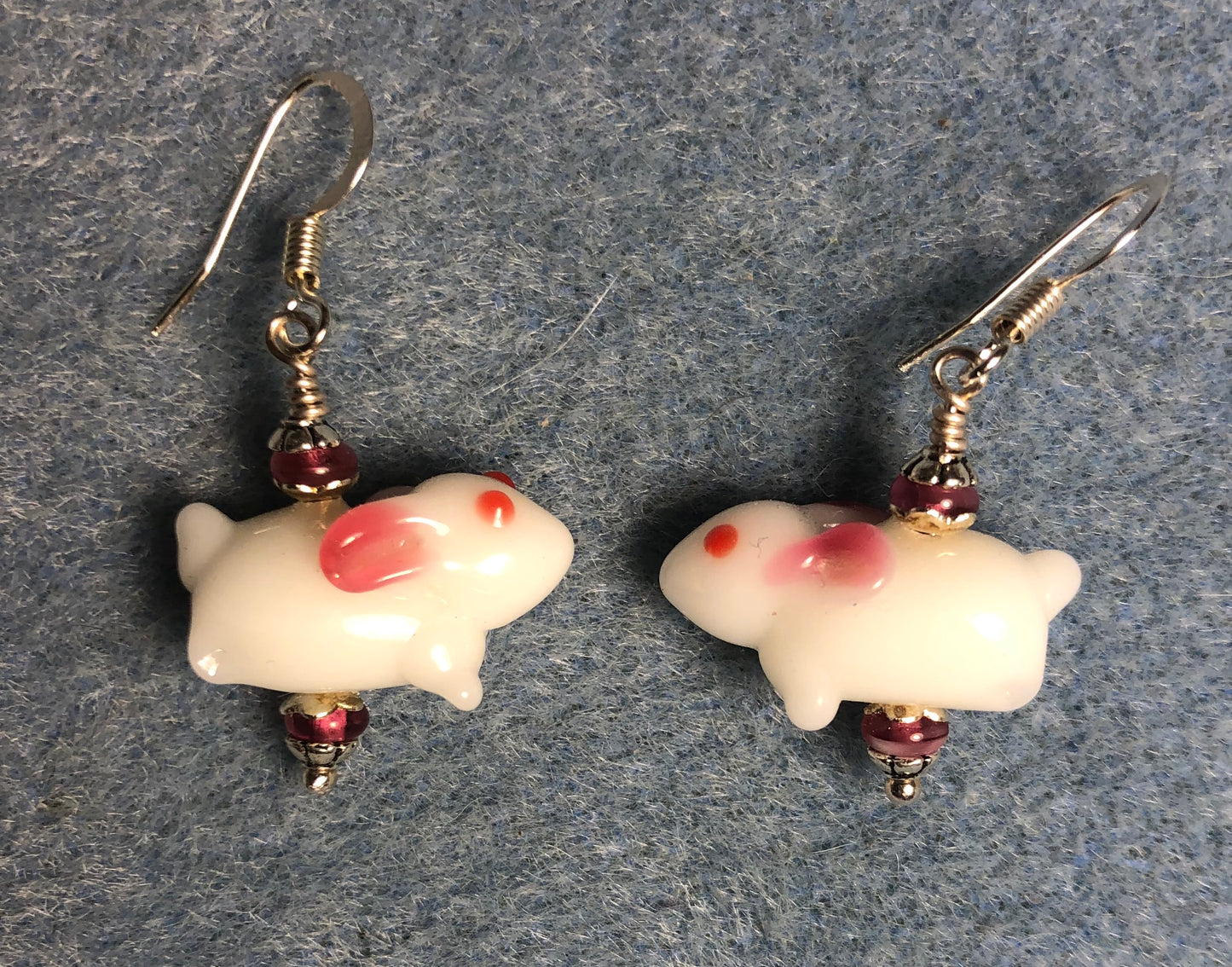 Small white and pink lamp work bunny rabbit bead earrings adorned with pink Chinese crystal beads.