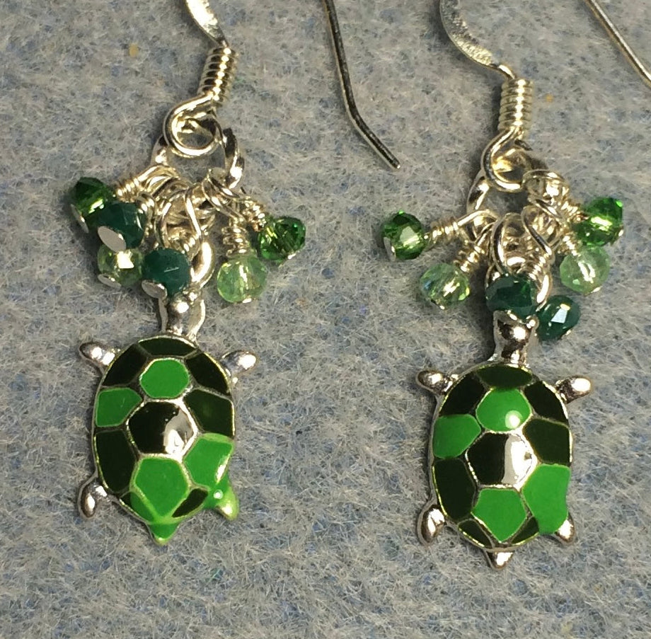 Bright green and dark green enamel turtle charm earrings adorned with tiny dangling bright green and dark green Chinese crystal beads.
