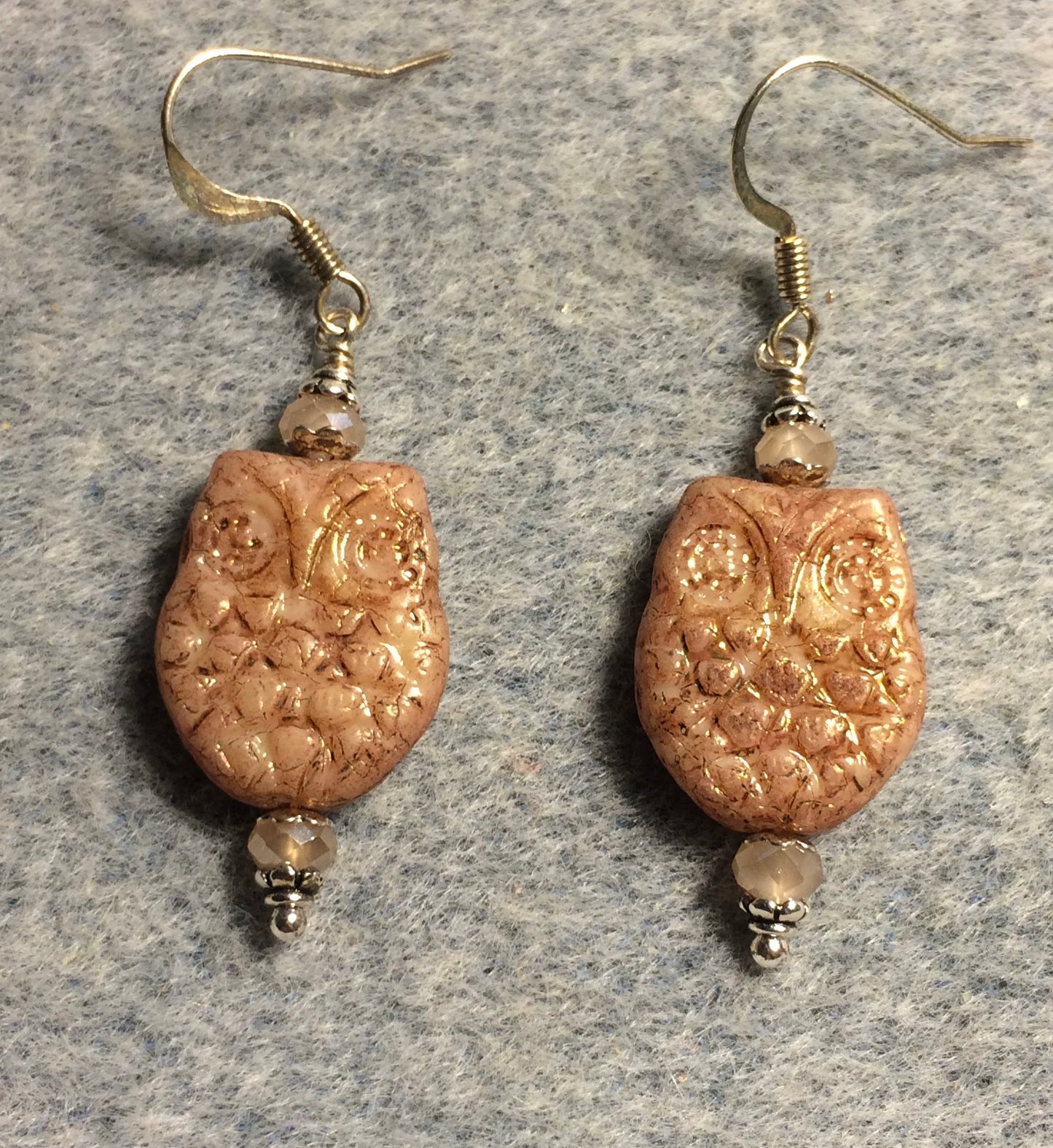 Peach Czech glass owl bead earrings adorned with peach Chinese crystal beads.