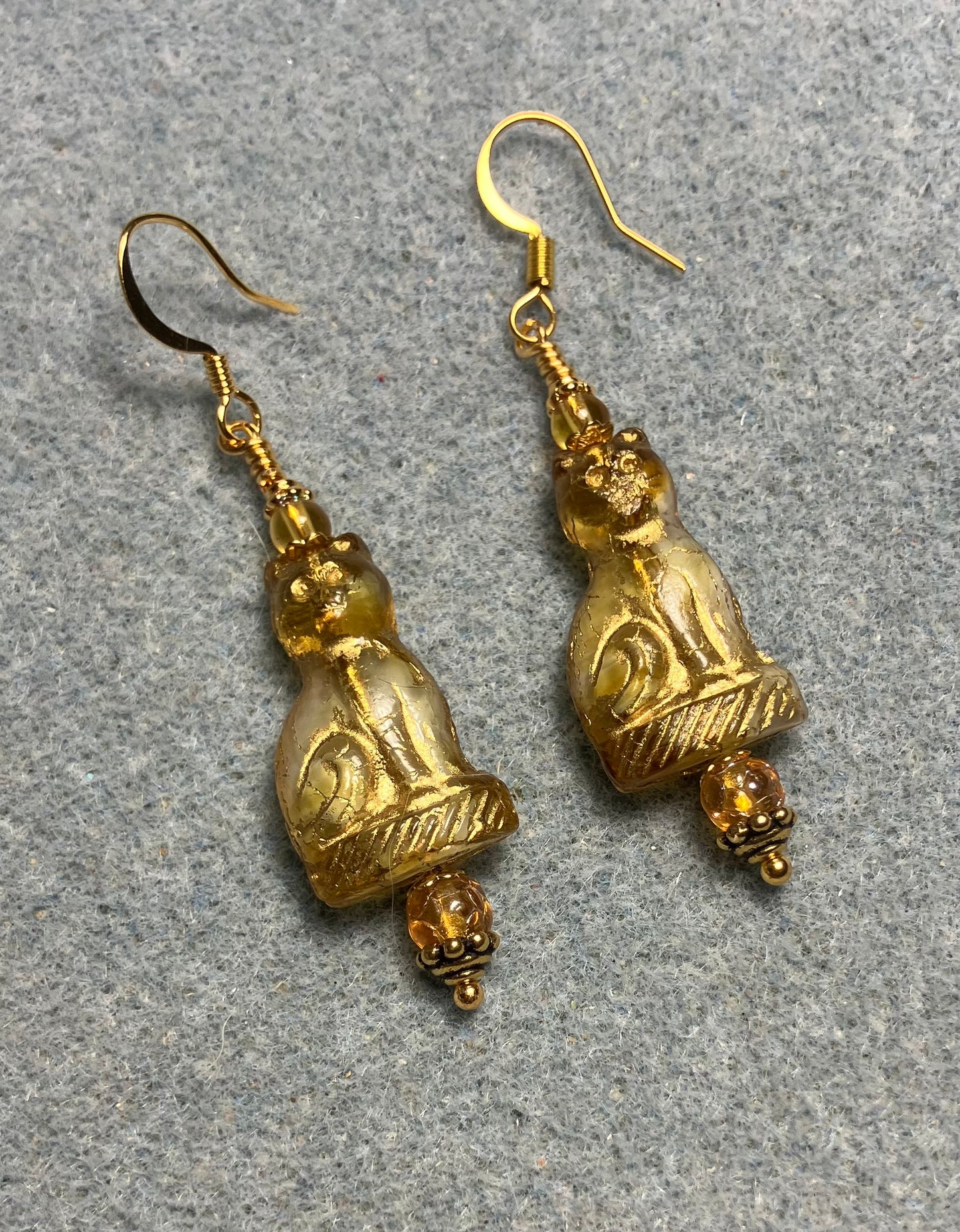 Topaz (with gold inlay) fancy Czech glass cat bead earrings adorned with topaz Czech glass beads.
