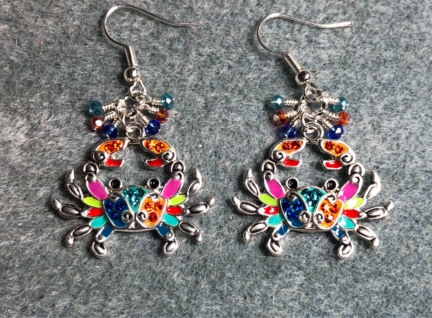 Blue, red, and turquoise enamel crab charm earrings adorned with tiny dangling blue, red, and turquoise Chinese crystal beads.