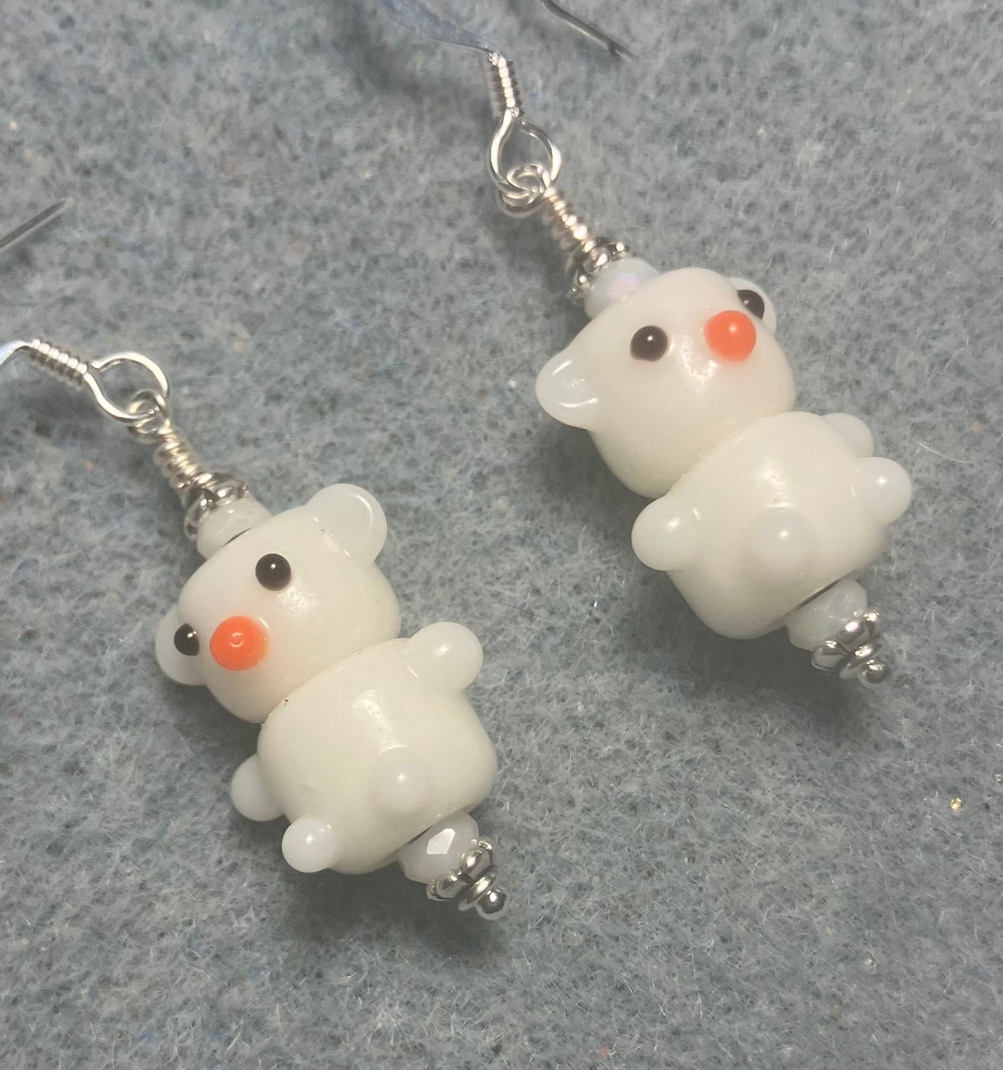 Small white lamp work teddy bear bead earrings adorned with white Chinese crystal beads.