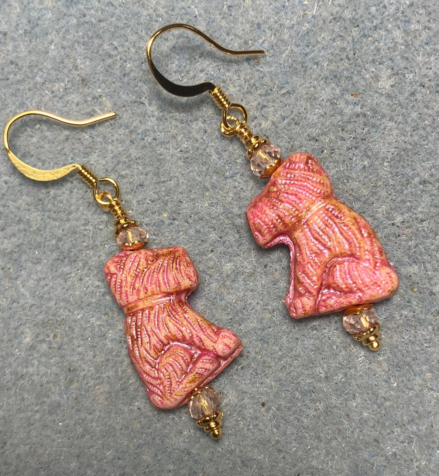 Pink Czech glass Schnauzer bead earrings adorned with light pink Chinese crystal beads.