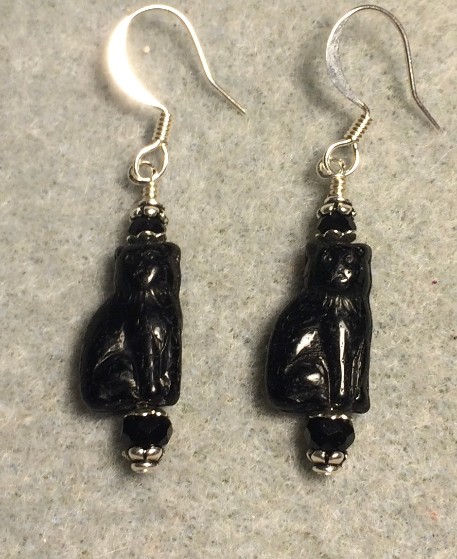 Small opaque black Czech glass cat bead earrings adorned with black Chinese crystal beads.