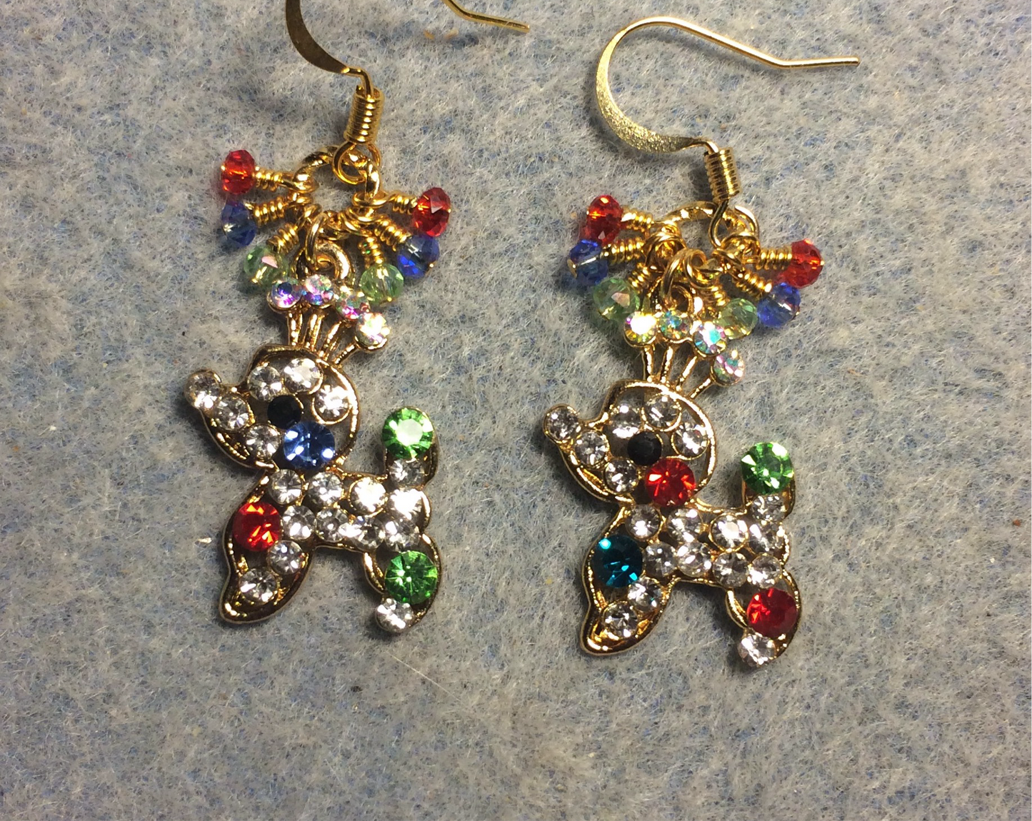 Red, blue, and light green rhinestone poodle charm earrings adorned with tiny dangling red, blue, and light green Chinese crystal beads.